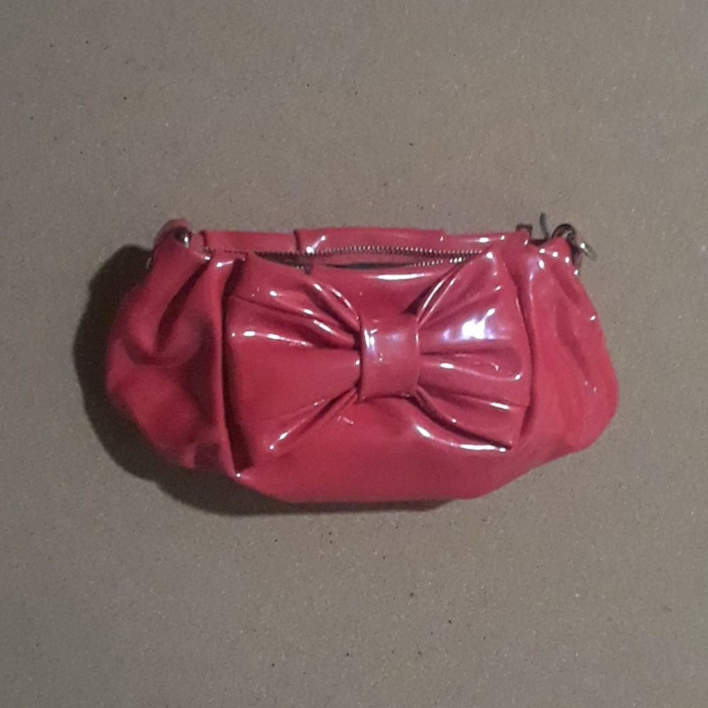Red handbag.